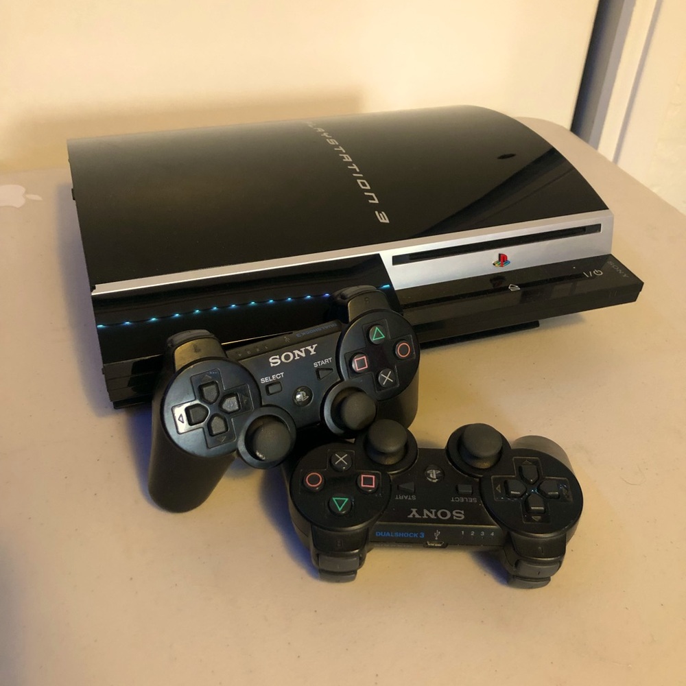 PS3 with 2 controllers, all cords, and manuals
